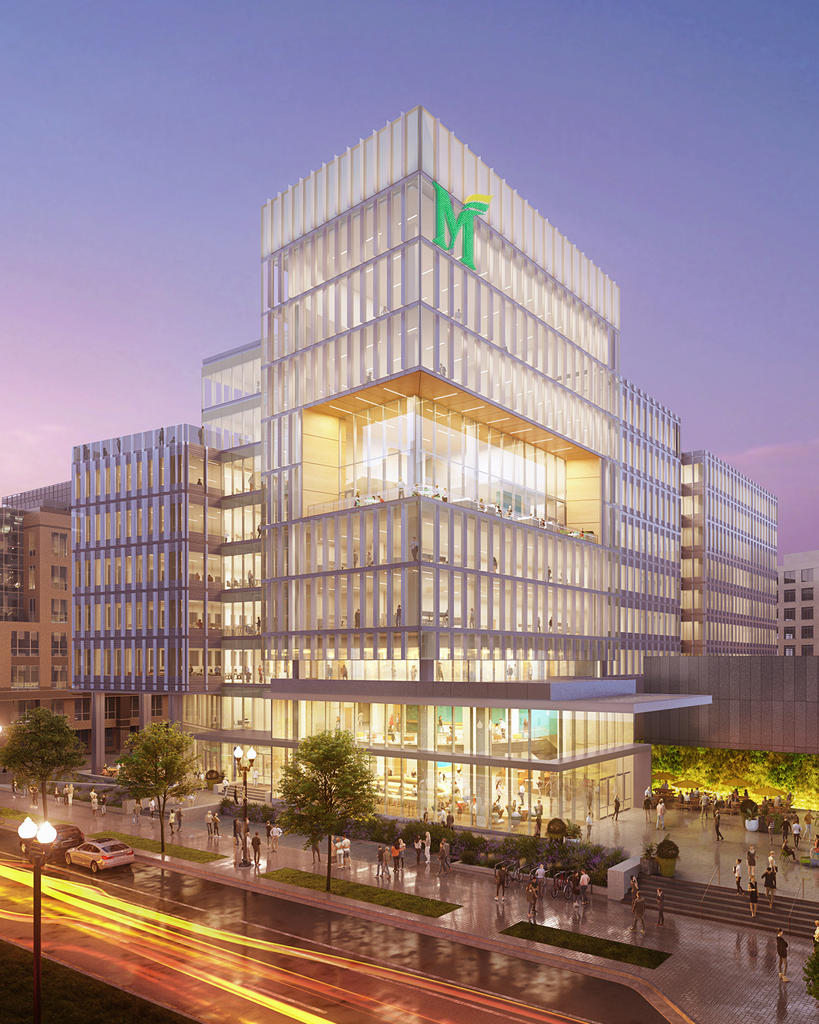 realistic artist rendering of the future Fuse building at twilight, with people inside the glass windowed building and also walking around outside it.
